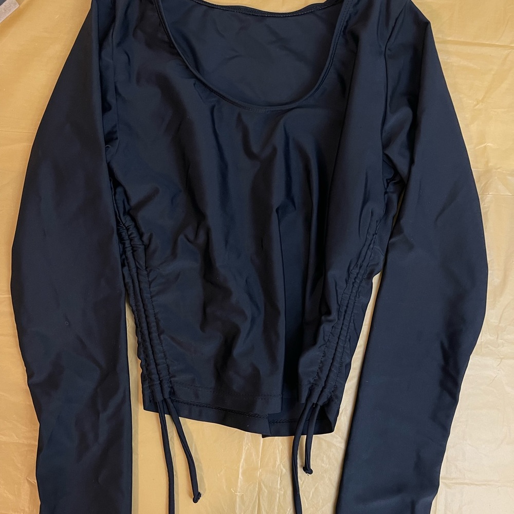 Shein girls long sleeve midriff with adjustable sides.